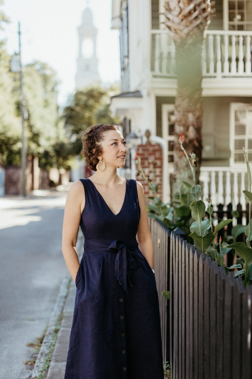 Woman in blue dress in Downtown Charleston, SC. Nicole Pontón Photography.